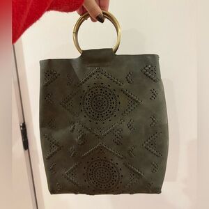 Green suede bag with gold ring handle
